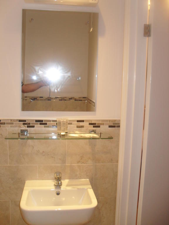 Albany Guest House Bath Rum bild
