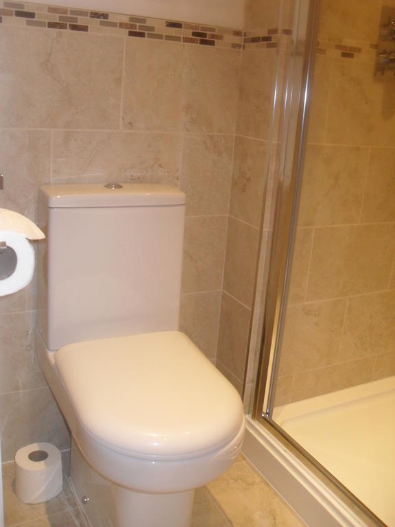Albany Guest House Bath Rum bild
